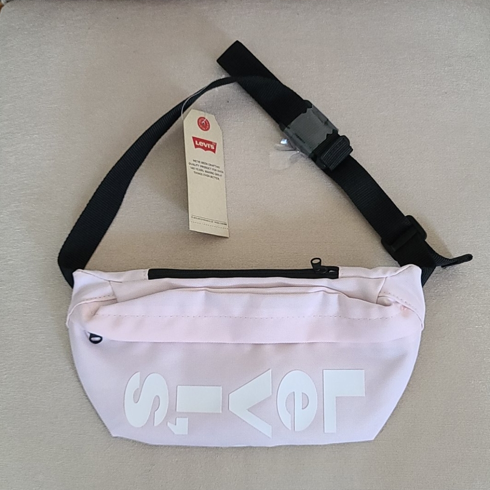 Levi's pink logo graphic travel crossbody bag
